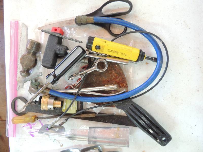 lot 74 image: Screwdriver, Freon hose, scissors, hose mender, drill bits, scraper