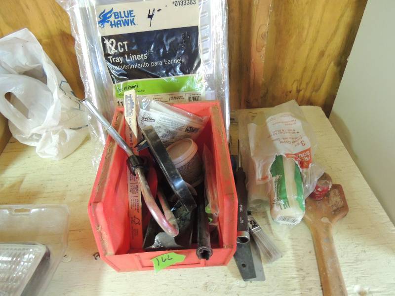lot 166 image: 12 paint trays, 2 rollers, paint brush, spackling paste and stir sticks