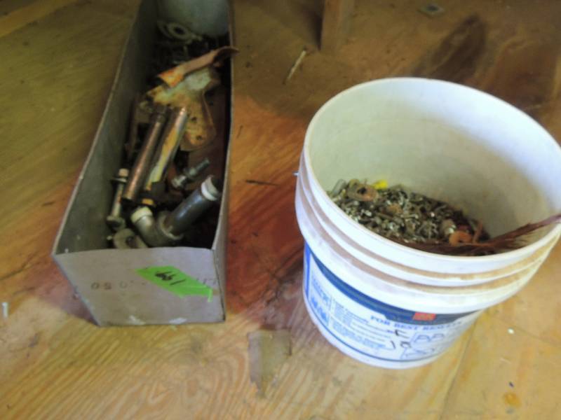 lot 199 image: Metal tray full of assorted screws, nuts , bolts , washers, spacers, nails and bucket with same
