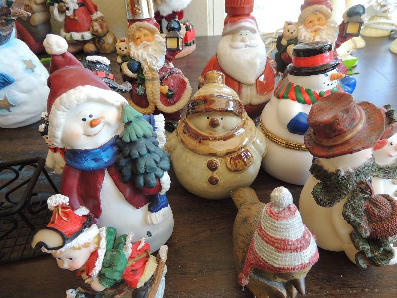lot 206 image: BLK.  metal basket, Santa , SNOWMAN FIGURINES DISPENSERS, BIRD, ELF and more
