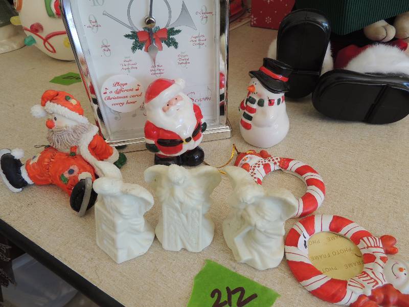 lot 212 image: Christmas dcor  - ANGEL FIGURINES, FROSTY PHOTO FRAMES, SNOWMAN, SANTA FIGURINS HOWARD MILLER CHRISTMAS CLOCK& More