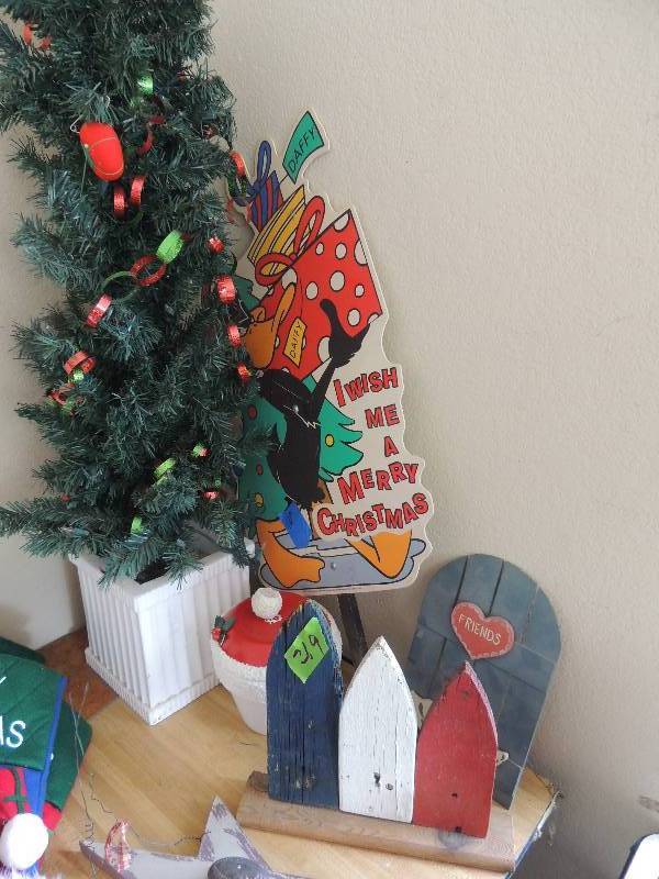 lot 219 image: Red white and blue dcor, friends gate, daffy duck sign, 3 12 foot Christmas tree and more