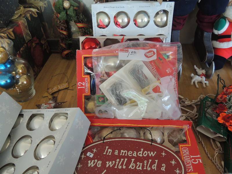 lot 223 image: Glass ornaments in box, bag of hooks, pine cone wreath, and reindeer wall pocket