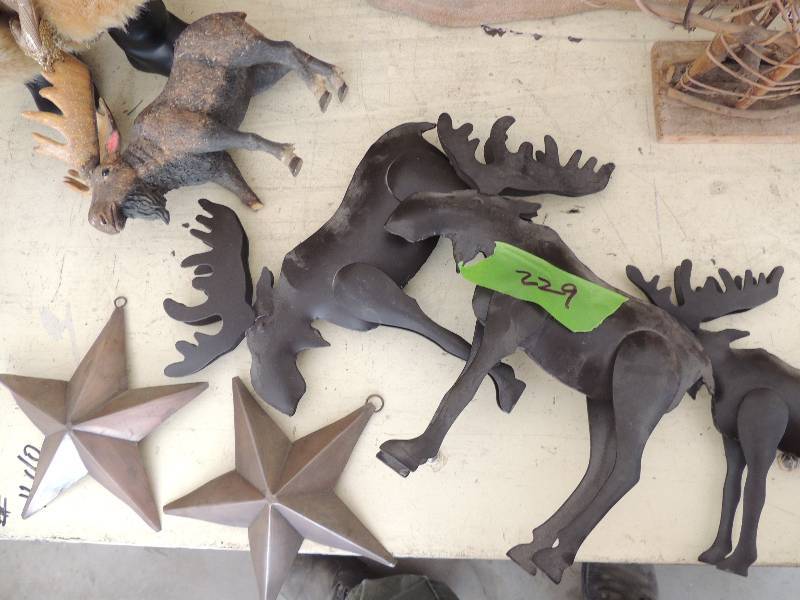 lot 229 image: 3 tin mooses, 1 clay moose, 2 brass Texas stars