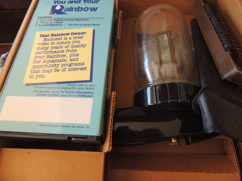 lot 243 image: Rainbow vacuum- a few attachments
