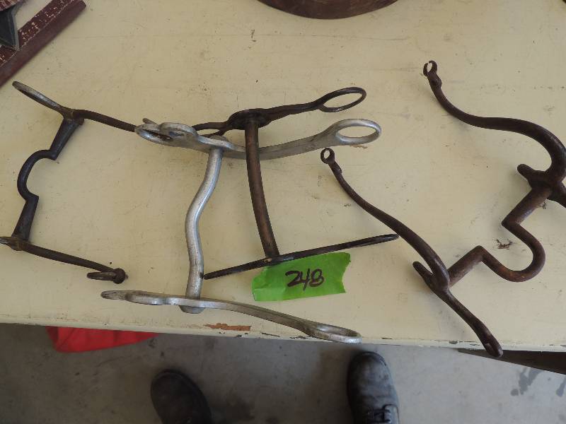 lot 248 image: 4 horse bits (one with stars)