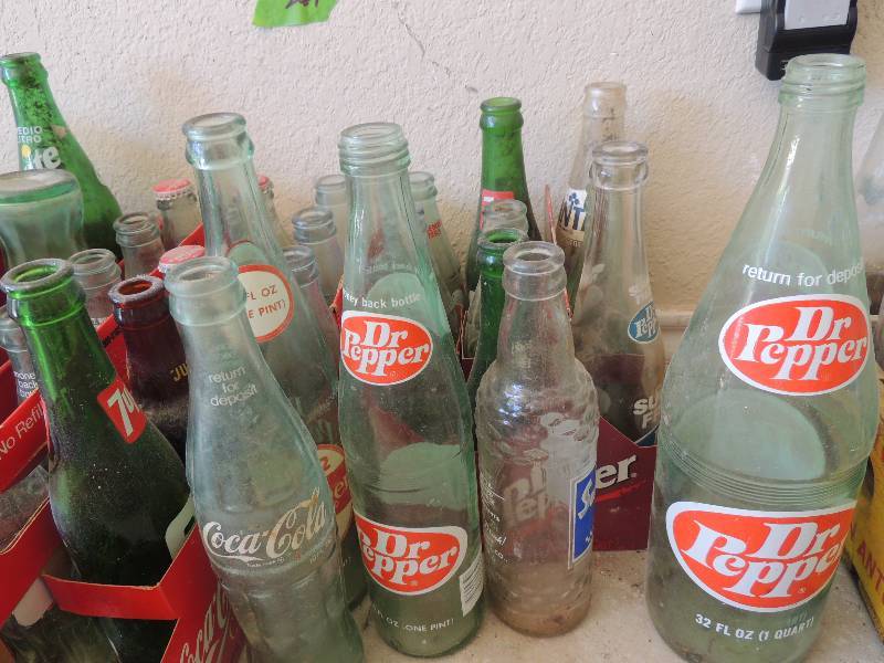 lot 261 image: Various Pop Bottles -  QT. Dr. Pepper, Pint DP, Sprite,  Coke( PT., 12 OZ., 10 OZ.,) 7UP  - 24 PLUS BOTTLES