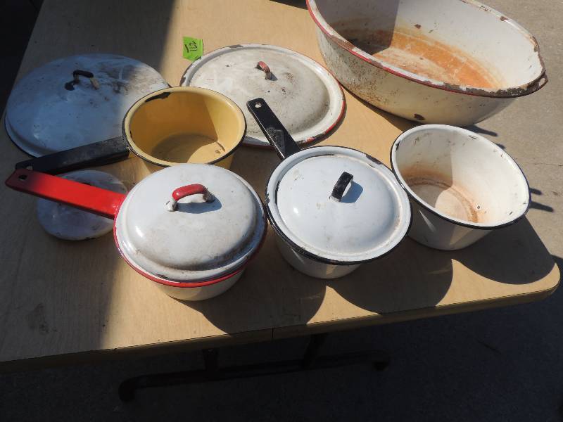 lot 271 image: White saucepans, red and black with lids yellow sauce pan with 2 large wash basins red trim  - ENAMELWARE