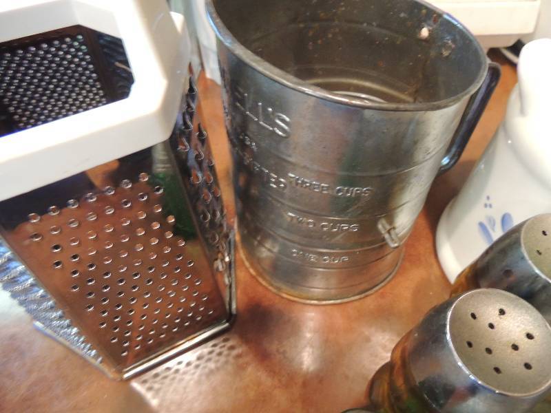 lot 309 image: Lot of kitchen utensils- S&P shakers, cheese grater, sifter etc.