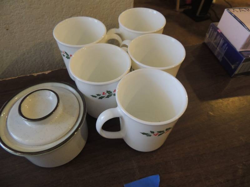 lot 382 image: 5 Christmas Corning Ware CHRISTMAS coffee cups and Village stoneware sugar containers