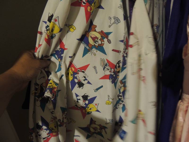 lot 404 image: Clothes- Dress cheerleading uniform and others. Little girls