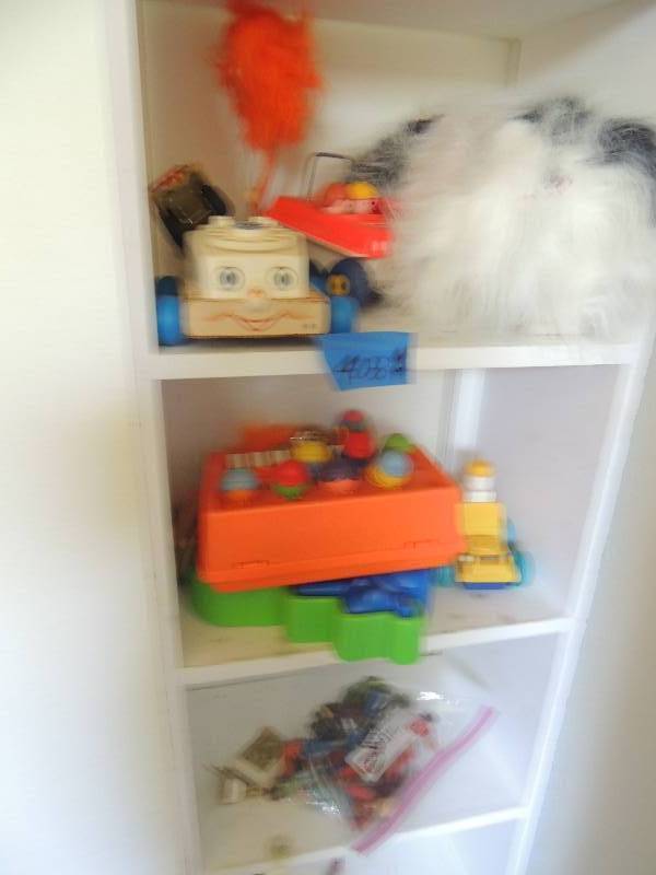 lot 408 image: Santa dog, 4 fisher price trucks, and more