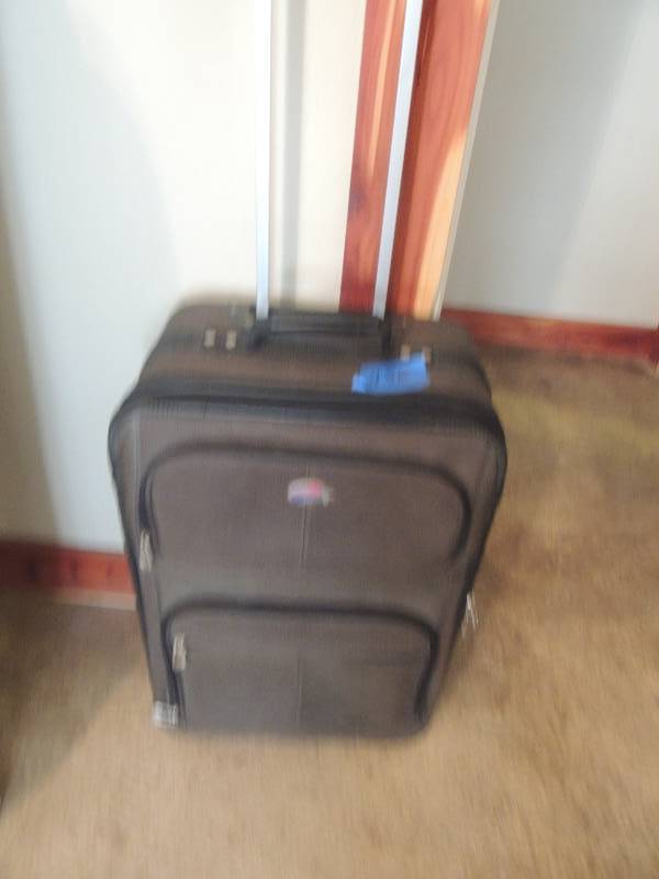 lot 456 image: American Tourister luggage bag on wheels