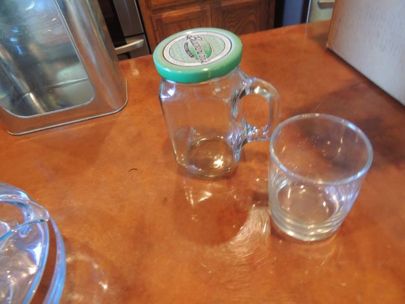 lot 459 image: Flour canister, Glass coffee pot and 1 berry colored mason jar