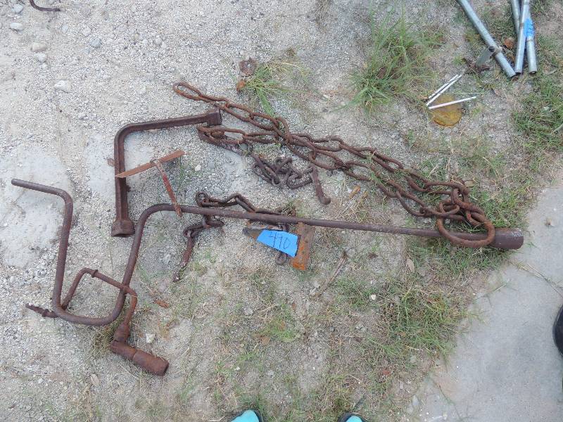 lot 490 image: Large bolt  LUG WRENCH, and chain for pulley