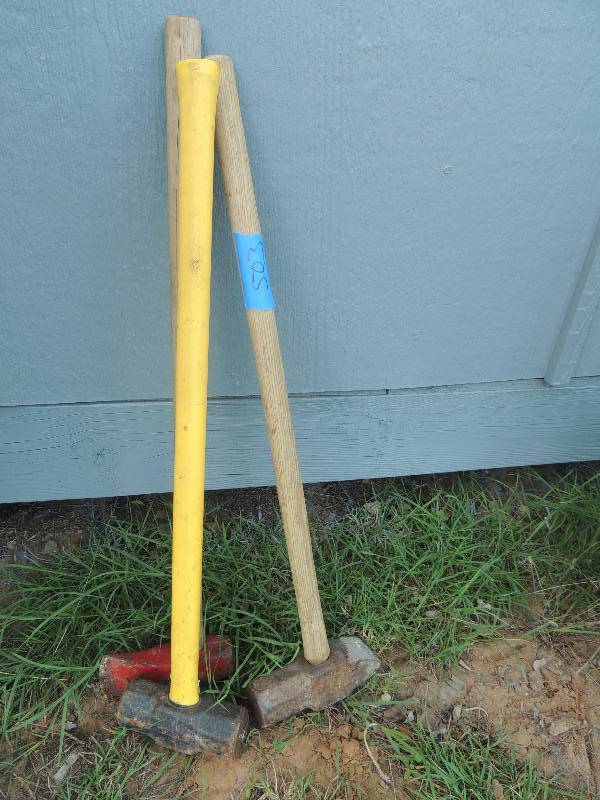 lot 503 image: 2 wooden handle  sledge hammers, 1 yellow  handle sledge hammer