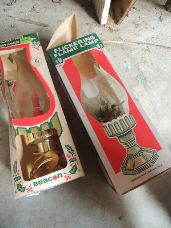 lot 56 image: 2 NIB Christmas oil lamps