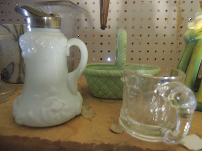 lot 78 image: Coffee cup and green vase