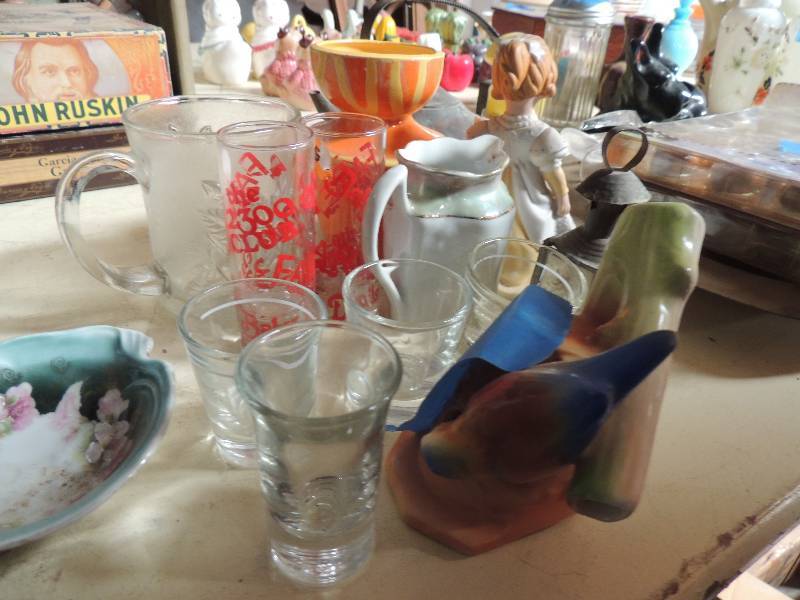 lot 404 image: 3 sets  of shot glasses Maryland bud stand and orange pottery cup