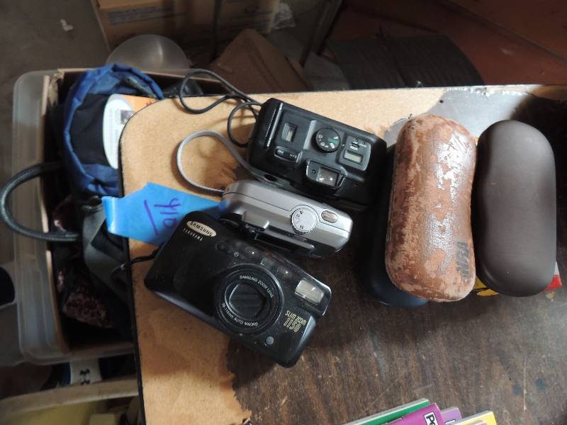 lot 410 image: NEW Kodak camera disposable, 3 eyeglass cases, Samsung Panorama 200m 1150 Kodak easy shore camera C-310a