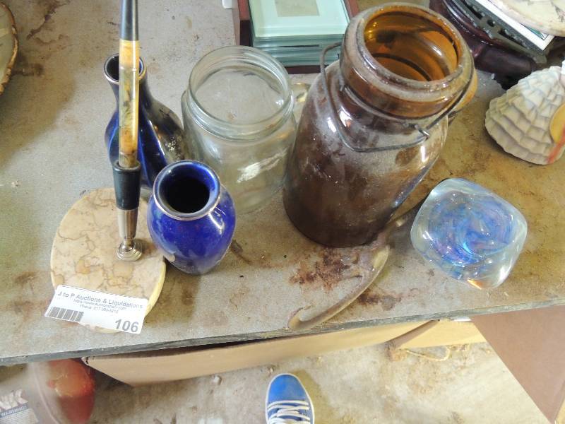 lot 106 image: Brown mason jar, blown glass rock, old fashioned ink pen with stone