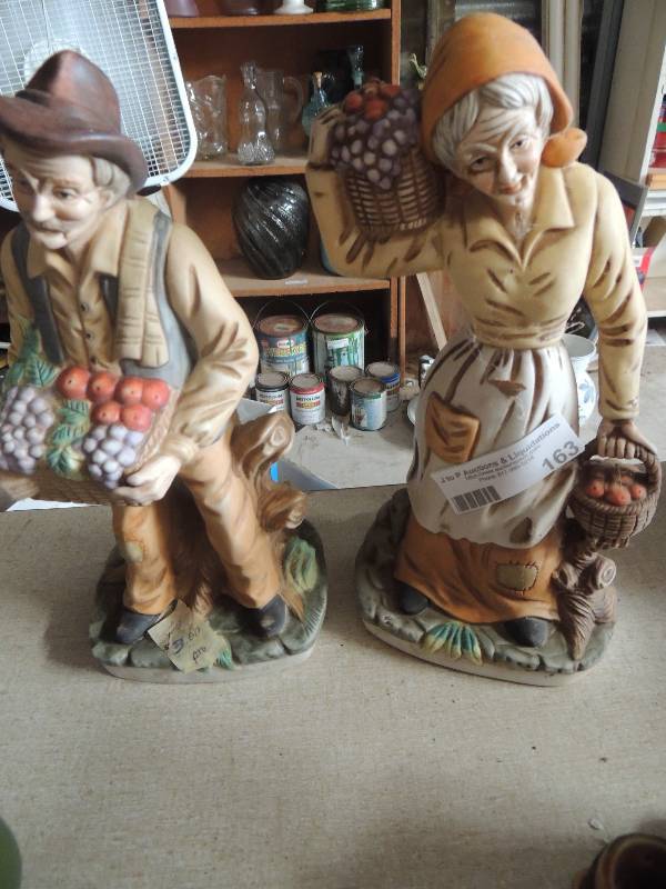 lot 163 image: Porcelain man and woman figurine