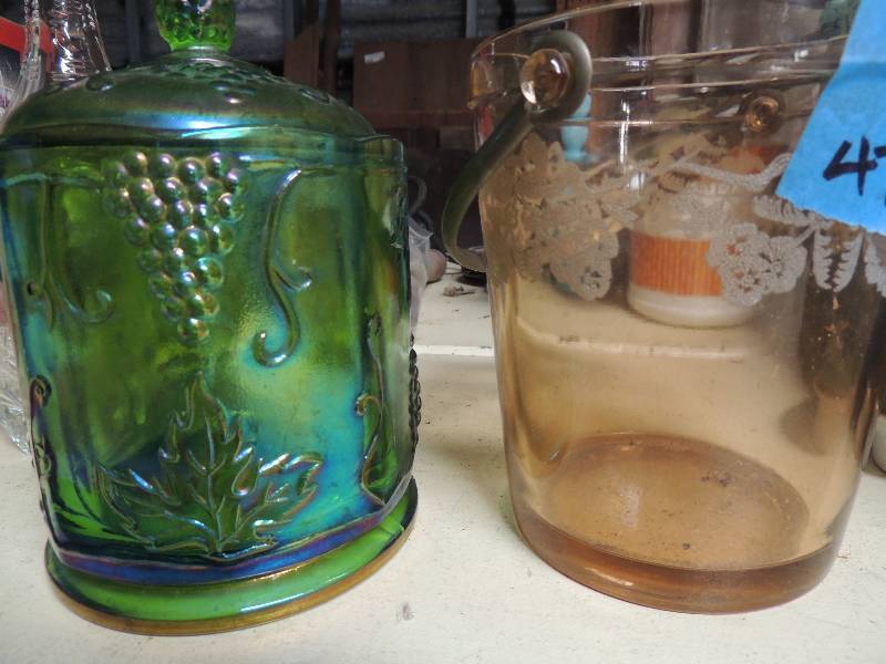 lot 473 image: Green canister with lid  orange canister no lid