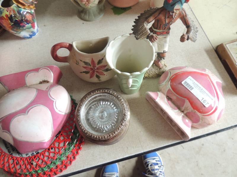 lot 167 image: Pair of heart bookends,  coasters, insulated hot mats Indian bird figurine
