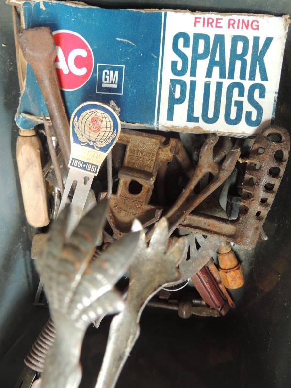 lot 178 image: Tub of spark plugs, wrenches 3 way tire tools and ice pic