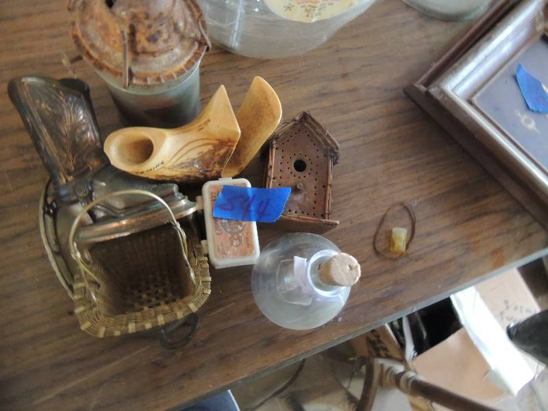lot 544 image: wickoil can, metal cowboy boot and glass canister