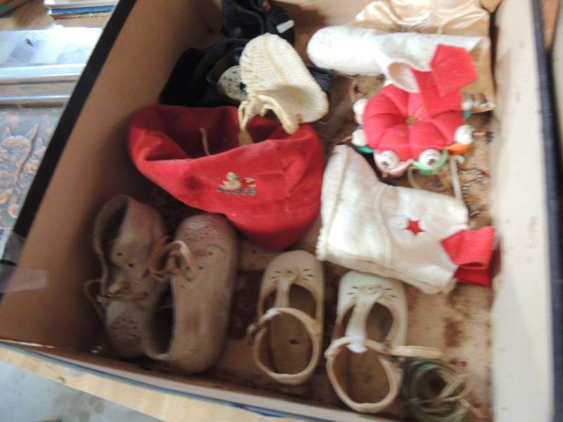 lot 557 image: 2 pair of baby shoes Baby boy duck hat and ceramic pin cushion doll