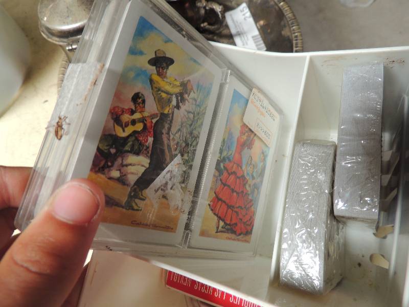 lot 214 image: 6 decks of cards in white case