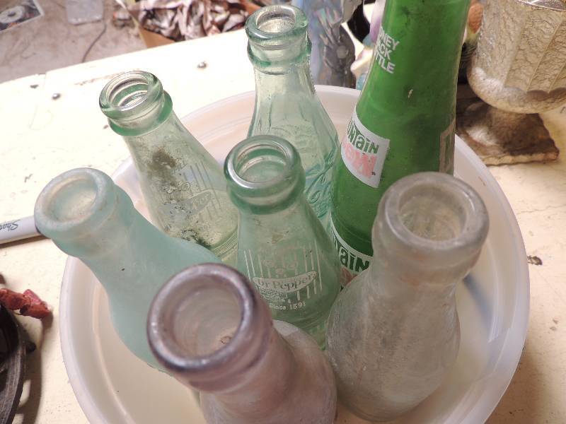 lot 216 image: Bucket of POP bottles - MOUNTAIN DEW, COCA COLA, DR. PEPPER