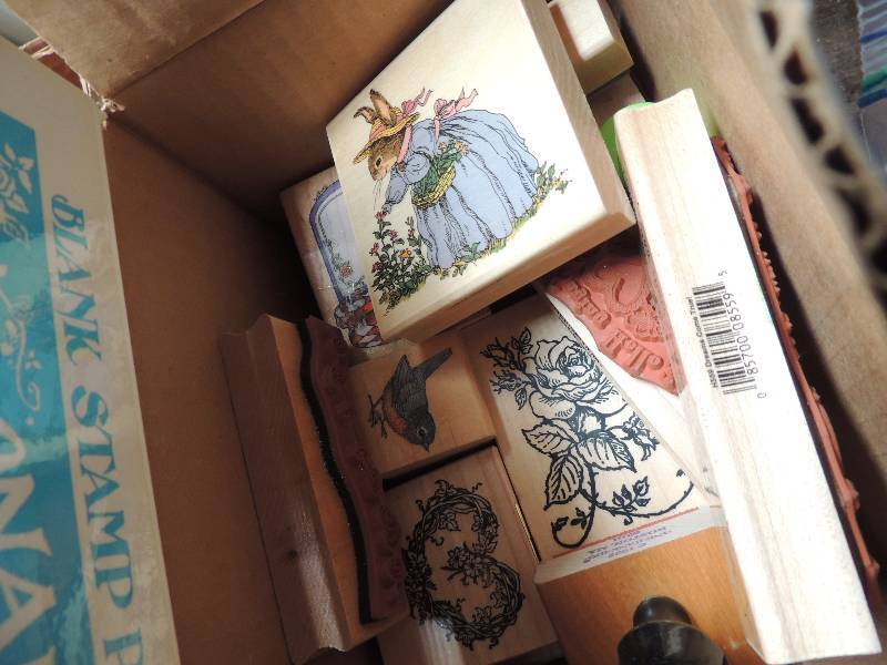 lot 565 image: Stamp pad with various stamps ( flowers, cards, names, animals)