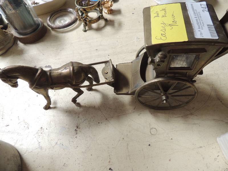 lot 247 image: Metal horse with wagon wheel buggy