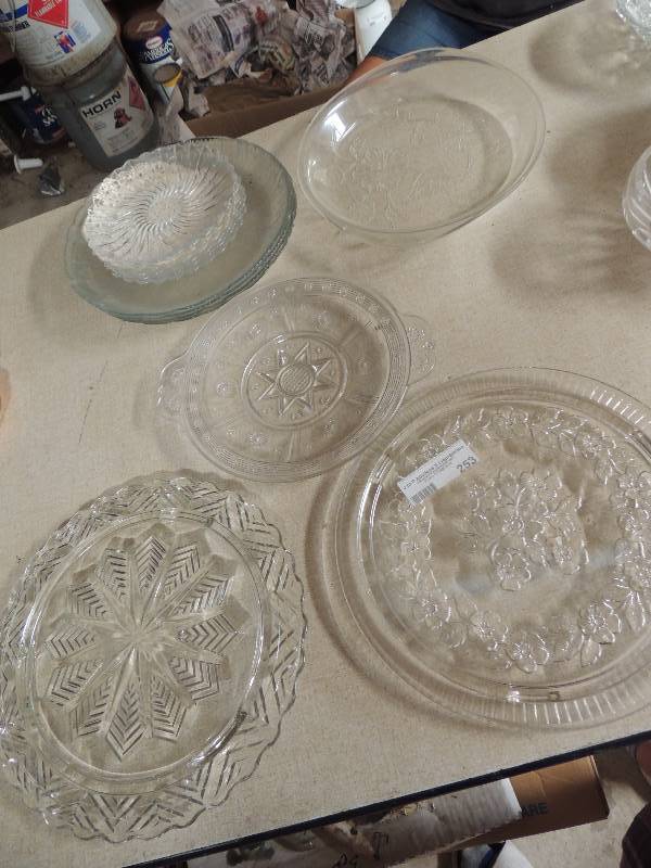 lot 253 image: 2 glass cake plates, 1 glass baking dish, 4 dinner plates and 6 saucers