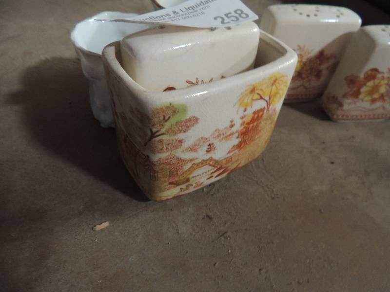 lot 258 image: Flower S&P shakers with matching napkin holder