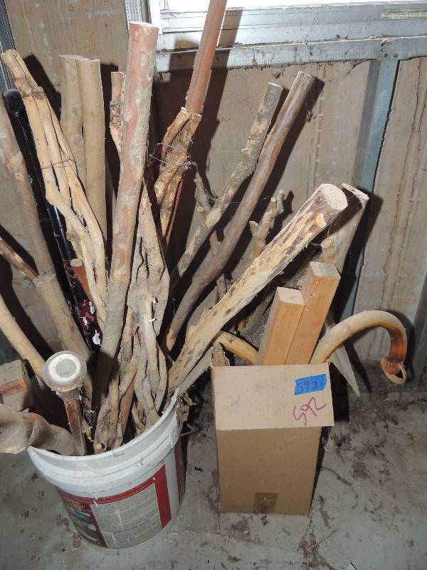 lot 592 image: Box of hand carved sticks