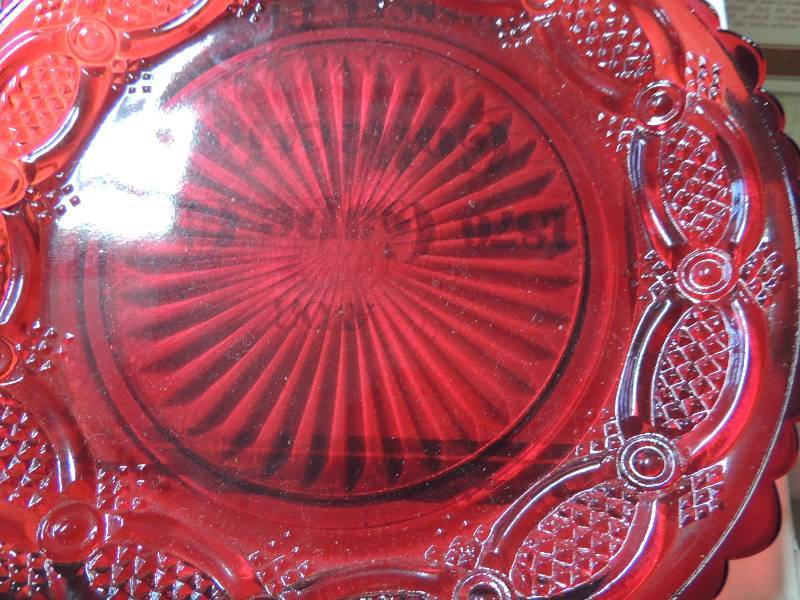 lot 270 image: AVON RUBY RED 1876 Cape Cod Collection- 1 mug,4 candles, and 4 plates