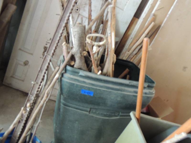 lot 601 image: Trash can full of walking sticks,,canes and sticks - Ready for carving