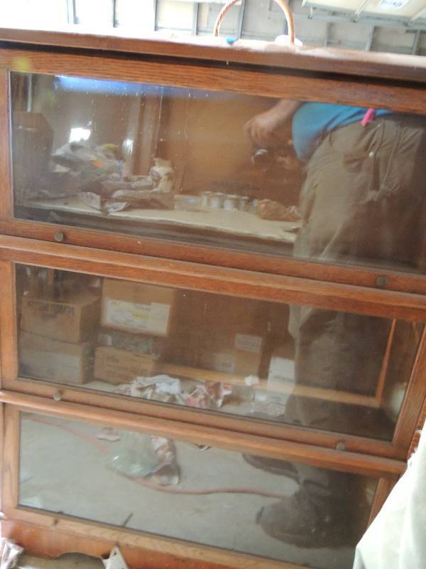 lot 665 image: Lawyers book case with 3 drop down glass doors