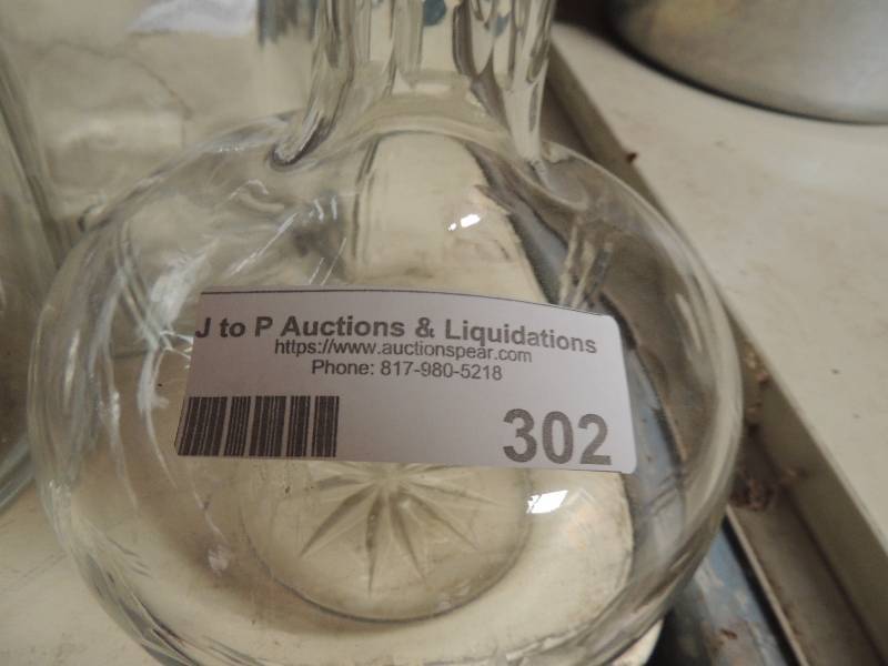 lot 302 image: 2 glass canisters 2 powder shakers