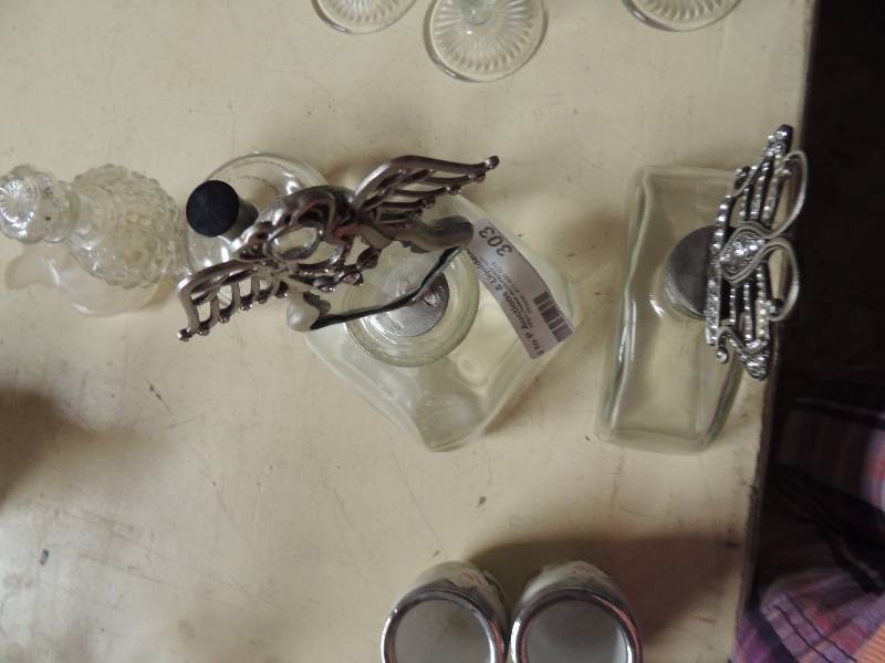 lot 303 image: Perfume bottle. 2 glass cannisters ( 1 with crown, one with angel