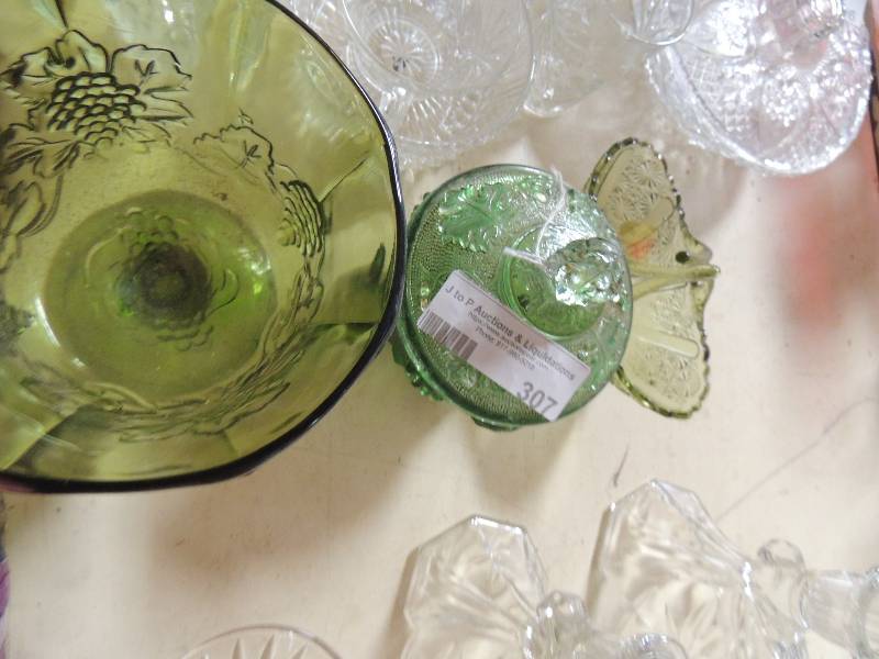 lot 307 image: Green pressed glass bowl, basket and lidded candy dish