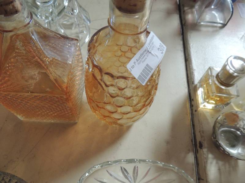 lot 309 image: Amber glass canisters with lids