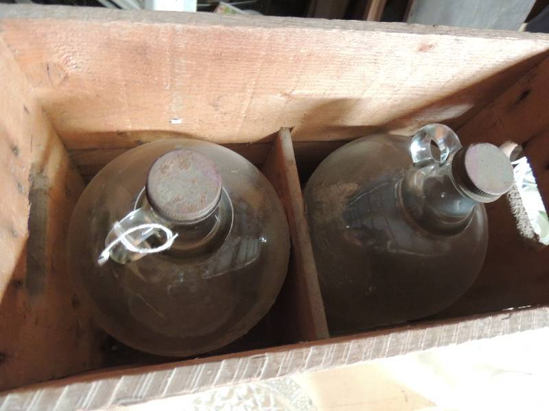 lot 310 image: Coca-Cola crate with 2 Fanta Grape soda SYRUP  Jugs