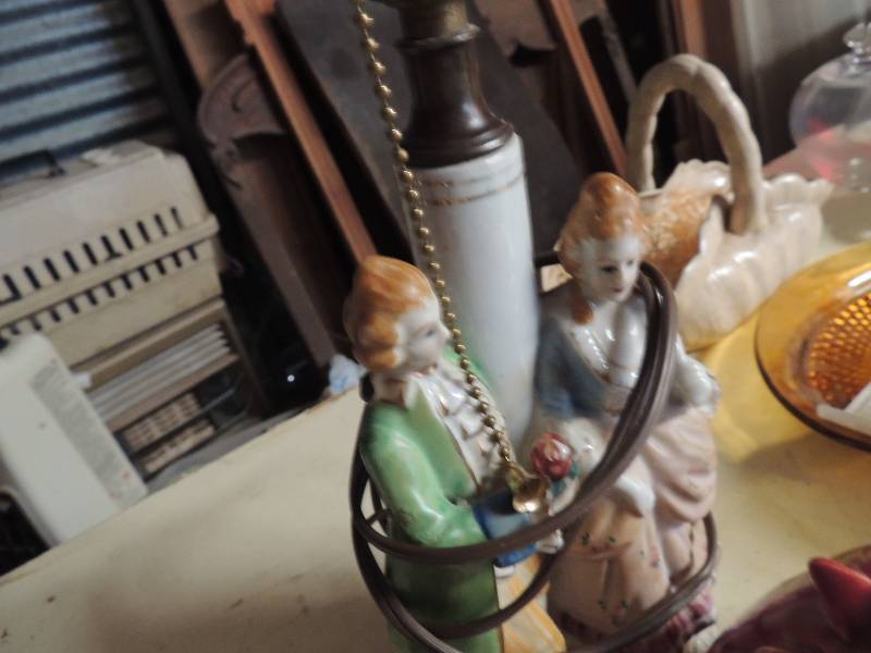 lot 328 image: Lamp no shade, rabbit holding carrots, skull red panther