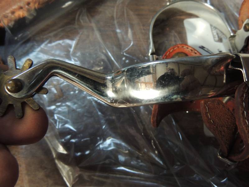lot 735 image: Matching set brown leather silver spurs-  hecho made Mexico