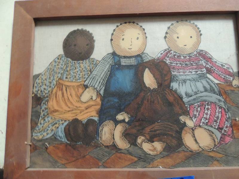 lot 783 image: Frame no glass 20x24 4 dolls 14x18 and Kitchen canister 24x30