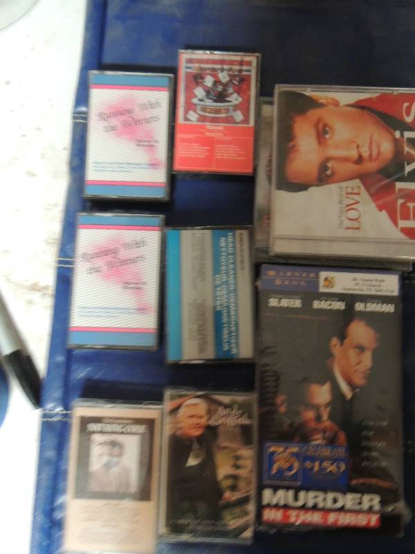 lot 789 image: VHS tape Murder in first,  6 cassettEs Nat King Cole and more plus 3 elvis CDs